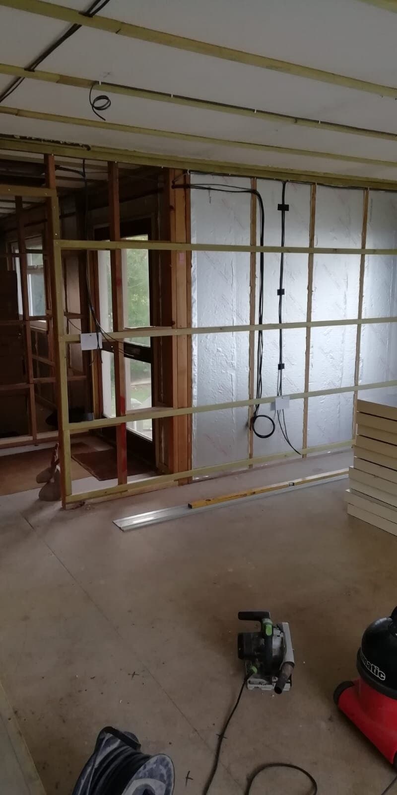 First fix wiring run through a new timber-framed room before plastering